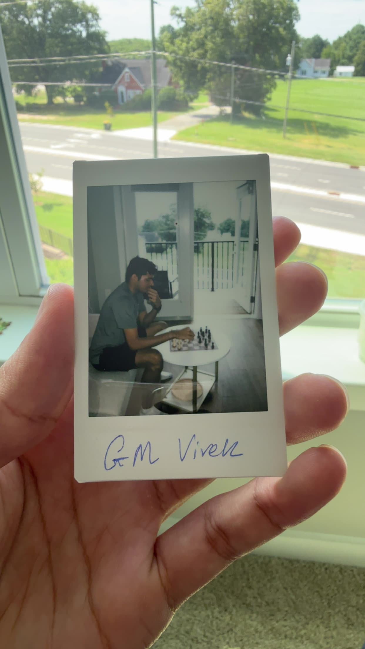 Polaroid photo labeled GM Vivek